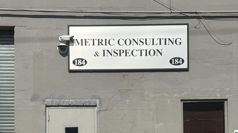 Metric Consulting & Inspection office entrance at 184 Engineers Drive, Hicksville